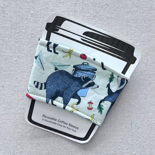 Raccoons on Cream Reusable Coffee Sleeve
