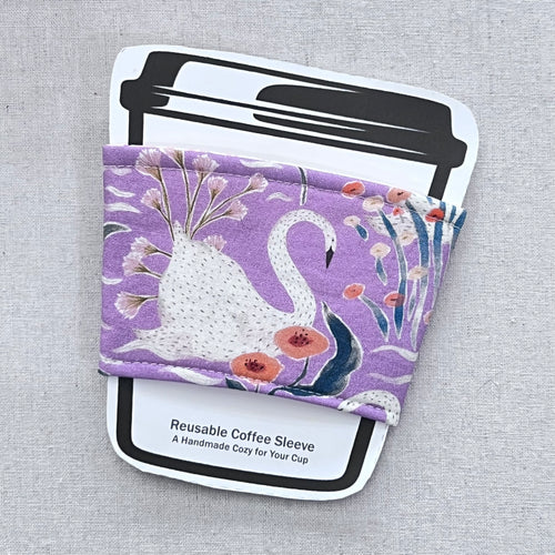 Swans on Lilac Reusable Coffee Sleeve